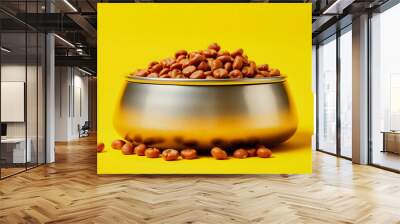 Dog food in a metal bowl. Yellow background isolated with white shades, png Wall mural