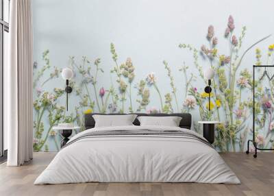 different wild flowers on paper background Wall mural