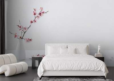 flowering cherry branch in  vase on white background Wall mural