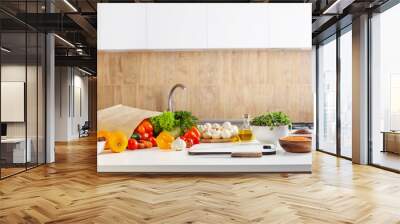 fresh health vegetarian food on white table in kitchen Wall mural