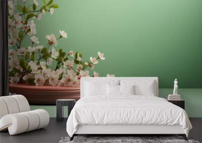 podium for product with white flowers on pastel green background Wall mural