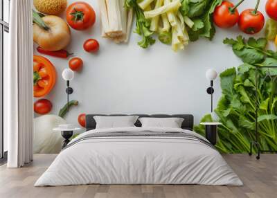 Organic fresh raw vegetables flatlay. Healthy food cooking background with various vegetable salad ingredients.  Vegetarian fresh raw food concept. Top view, copy space isolated with white highlight Wall mural