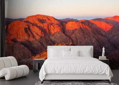 A view of orange morning sunrise at the top of Moses mountain Wall mural