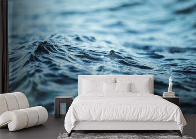 Closeup image of water waves outdoors at sea background. Wall mural