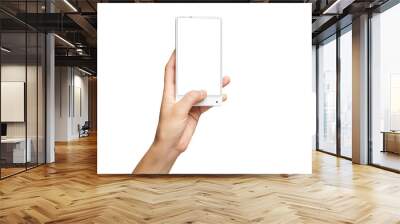 Mockup of female hand holding frameless cell phone with blank screen isolated at white background. Wall mural