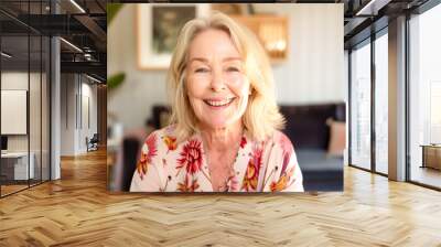 Happy middle aged senior woman talk on video call with friends family. Laughing mature old senior grandmother having fun speaking with grown up children online. Headshot portrait selfie webcamera view Wall mural