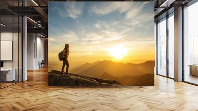 Hiker meets the sunset on the Moro rock in Sequoia national park, California, USA. Wall mural