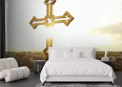 Golden cross of orthodox church with glitter on sky background Wall mural