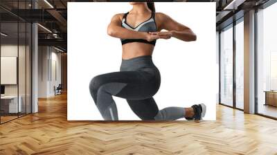 Studio shot of a sporty young woman exercising isolated on a transparent png background Wall mural