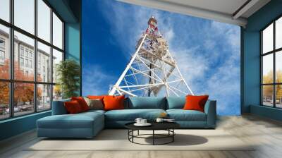 telecommunication tower with antennas against blue sky backgroun Wall mural