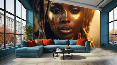 Black woman with gold makeup beauty fashion concept. Salon ethnic cultural theme. Portrait closeup Beauty fantasy African woman's Golden shiny skin. Fashion model posing. Professional metallic makeup Wall mural