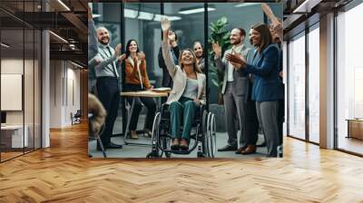 Diverse business people, teamwork colleagues having, social inclusion with disabled person friends talk,happy businesswoman in wheelchair going through reports while working female. Wall mural