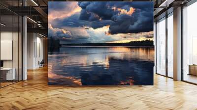 Dramatic sky over the lake at dusk, with dark storm clouds gathering and reflecting on calm waters. A lone duck glides across the water below, adding an element of movement to the scene Wall mural