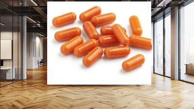 orange drug capsules isolated on a white background Wall mural