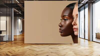 Profile photo of three women with different skin tones, each showing their unique beauty and diversity in their faces. The background is a neutral beige to create focus on facial features. Wall mural