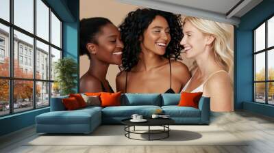 Three Multi Ethnic Group of Womans with diffrent types of skin and age groups together and looking on camera. Diverse ethnicity women - Caucasian, African and Asian posing and smiling. Wall mural