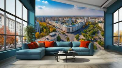 aerial drone photo shows the downtown panorama of Chisinau, showing several buildings and roads Wall mural