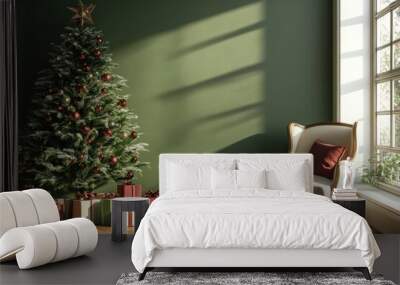 A Christmas tree with a star on top sits in front of a green wall. A white chair is placed in front of the window Wall mural