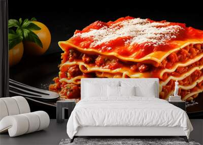 A plate of delicious food Lasagna on black background Wall mural