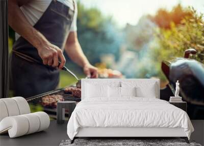 Unrecognizable man cooking beef on a barbecue grill in the backyard Wall mural