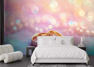 Close up of two golden rings on bokeh background, Valentine's day. Wall mural