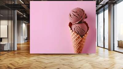 Soft Chocolate Ice Cream in a Waffle Cone on Pink Background, with Copy Space Wall mural