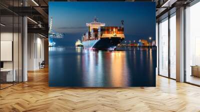 Container ship preparing to leave port late at night Wall mural