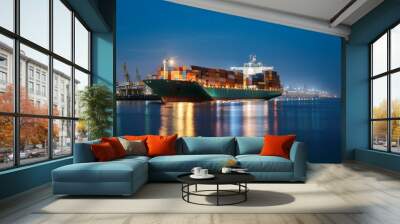 Container ship preparing to leave port late at night Wall mural