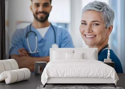 Team of smiling doctors looking at camera in medical office Wall mural