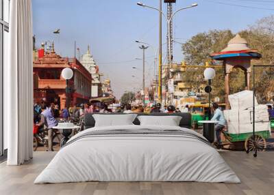 Crowded and traffic packed world famous market Chandni Chowk situated in front of Historical Red Fort. Wall mural