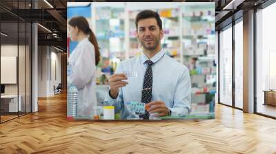 Pharmacists work in drug stores, selling products and giving advice to customers. Wall mural