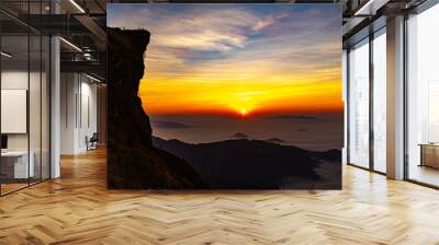 Beautiful landscape nature on peak mountain with sunrise in winter at viewpoint Phu Chi Fa Wall mural