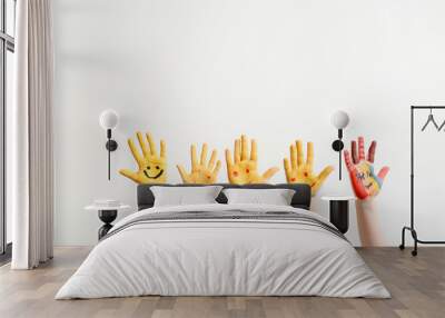 Close children's hands painted with yellow paint Wall mural