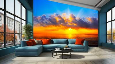 panorama of sunset with lighted clouds on the sea Wall mural