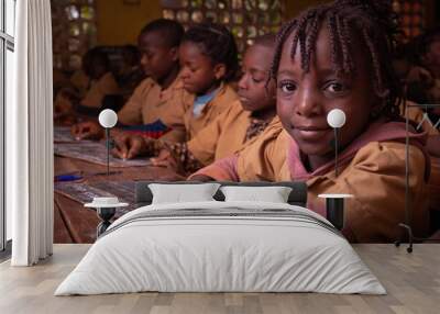 Students in a school in africa take the lesson and write notes on a blackboard with chalk. Children at school in Africa Wall mural