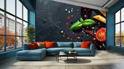 A black background with a variety of food items including tomatoes, basil, and cheese. Concept of abundance and variety, with the different food items arranged in a visually appealing manner Wall mural