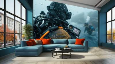 A man in a black wetsuit is looking at a watch while underwater Wall mural