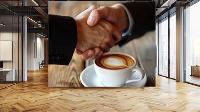 Business and Finance Concept : Businessmen shaking hands over coffee Wall mural