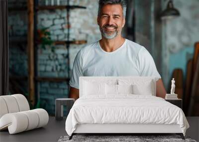 A man is smiling and wearing a white shirt Wall mural