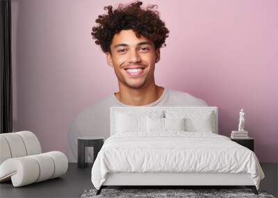 A man with a big smile on his face is wearing a white shirt Wall mural