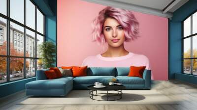 A woman with pink hair is wearing a pink shirt and smiling Wall mural