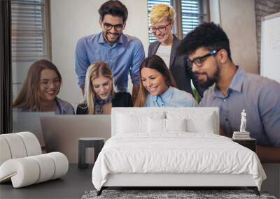  Group of young business people in smart casual wear working together in creative office Wall mural