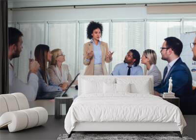  Group of young business people working together in creative office. Selective focus. Wall mural