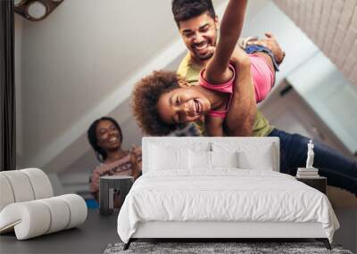 African american family spending time together at home. They are having fun Wall mural