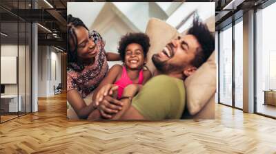 african american family spending time together at home. they are having fun Wall mural