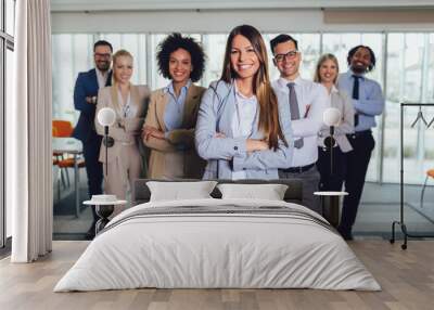 Group of happy business people and company staff in modern office, representig company.Selective focus. Wall mural