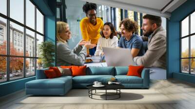 International workers group and team leader having teamwork discussion managing project at work in meeting room. Wall mural