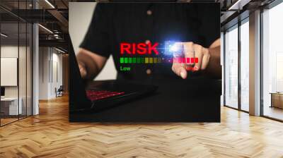 Business professional adjusting risk level on a digital interface. Wall mural