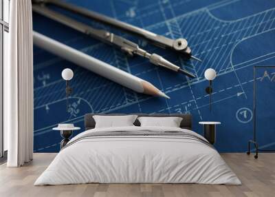 Drawing tools lying over blueprint paper Wall mural