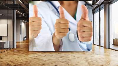 Three medicine doctor hands showing OK or approval sign Wall mural